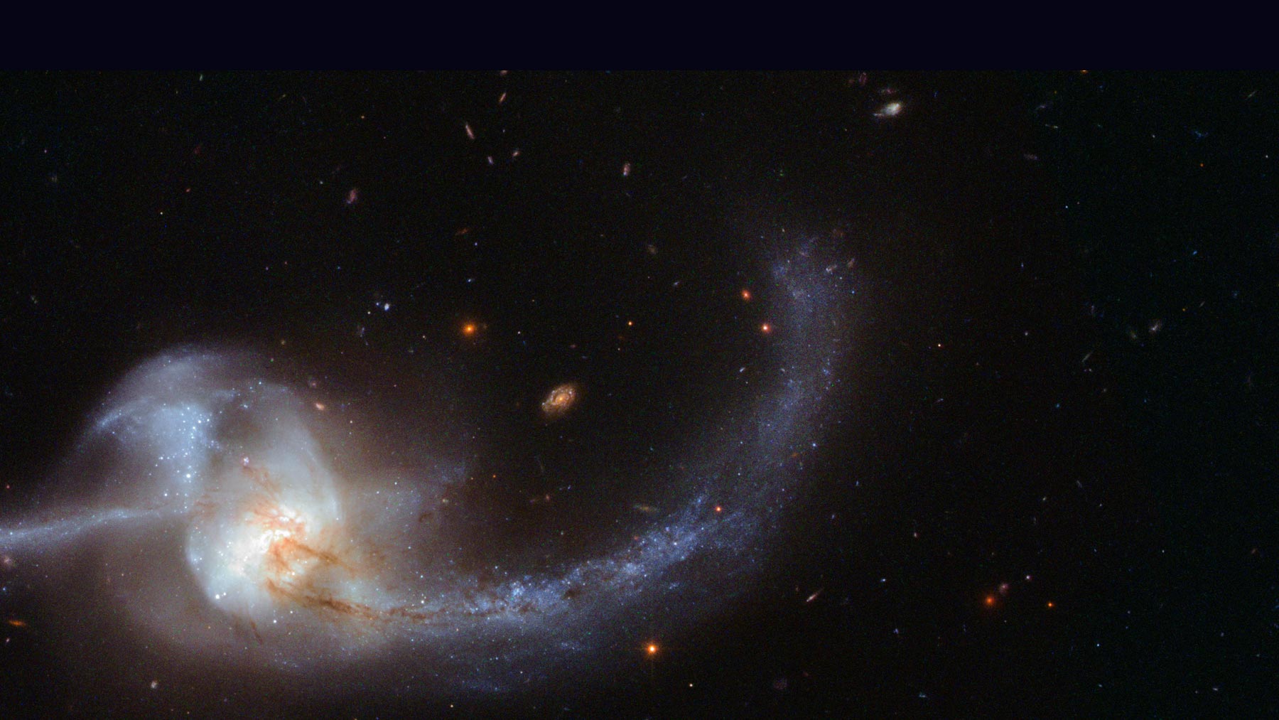 Background image of a spiraling galaxy